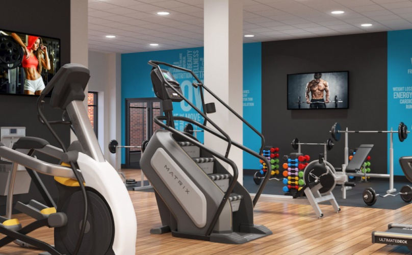 Fitness center with treadmills, weights, exercise bikes, and ellipticals.  
